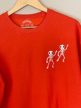 Load image into Gallery viewer, Dancing Skeleton Patch Pocket Halloween Sweatshirt
